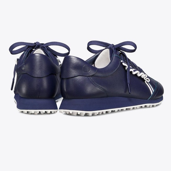 tory burch golf ruffle trainers